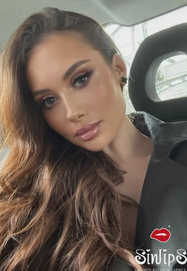 Kimberley, petite Russian escort, selfie in a car